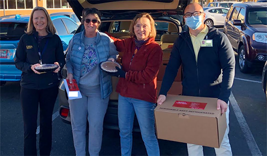 Volunteers from UC Davis Hospice provide Thanksgiving meals for hospice patients.